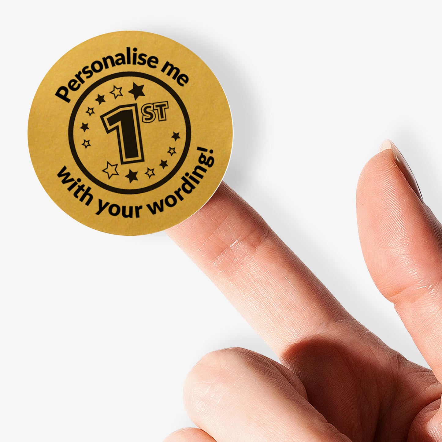 Gold sticker with text 'Personalise me with your wording!' held by a finger.