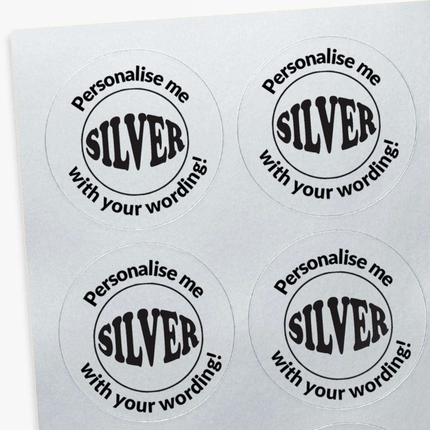 Four round stickers with 'Personalise me SILVER with your wording!' text on a white background