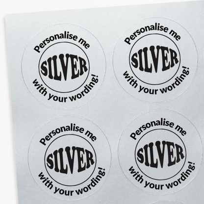 Four round stickers with 'Personalise me SILVER with your wording!' text on a white background