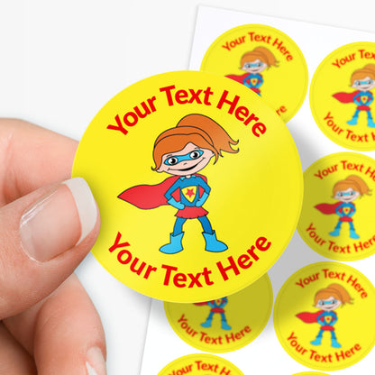 Superhero-themed stickers with customizable text held by a hand