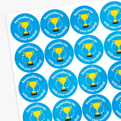 Sheet of blue stickers with gold trophies and text 'Personalise me with your wording!' on a white background.