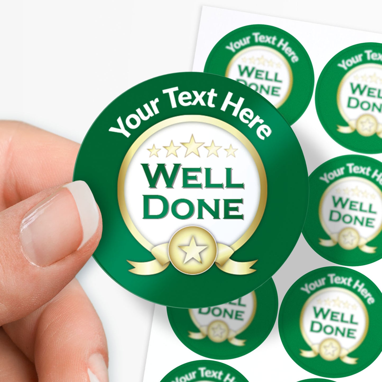 Green 'Well Done' stickers with customizable text held by a hand.