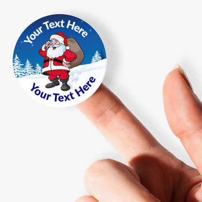 Round customizable sticker with Santa Claus design held by a hand