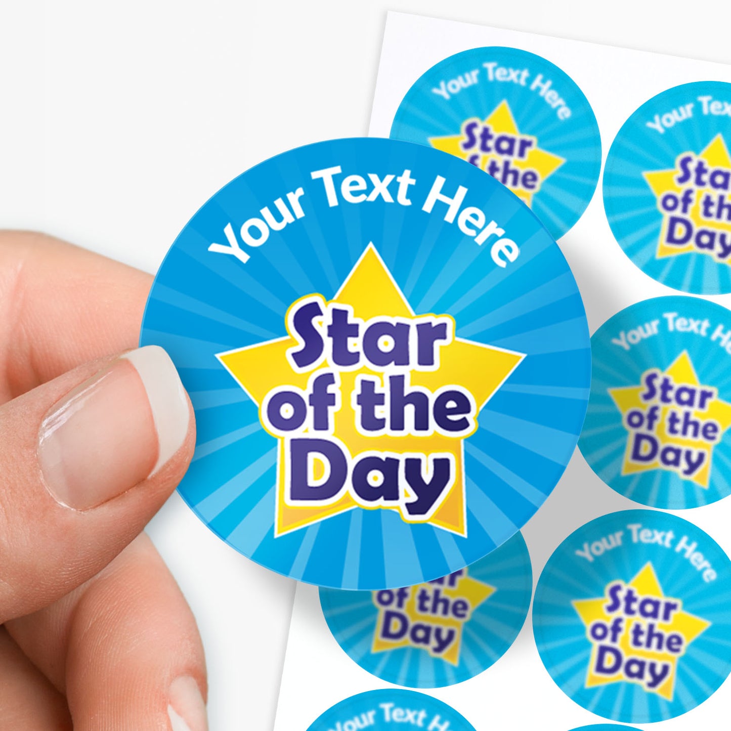 Personalised star of the day stickers with wording your text here between a finger and thumb