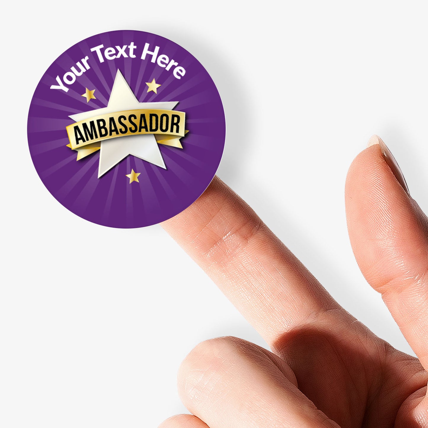
Sheet of purple 'Ambassador' stickers with customizable text On a finger