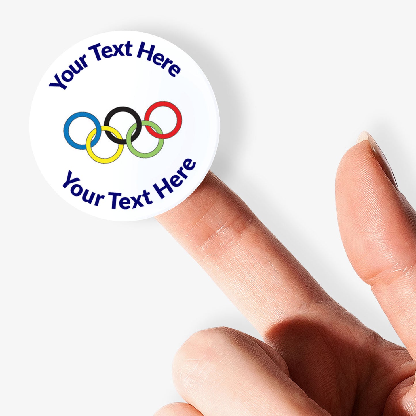 White sticker on finger with Olympic rings as a central image.  Space for personalisation above and below the image.