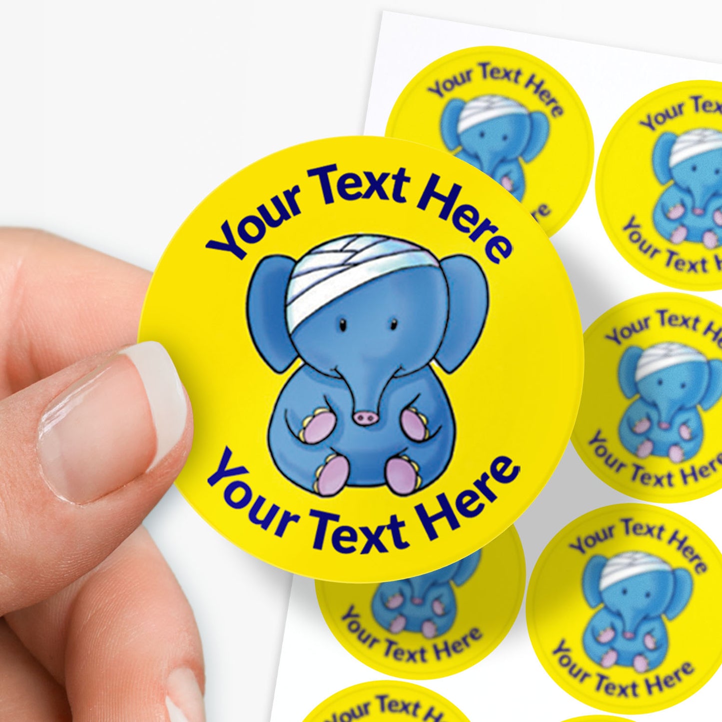 Yellow stickers with an elephant with a bandage on it's head as a central image.  Space for personalisation above and below the image.