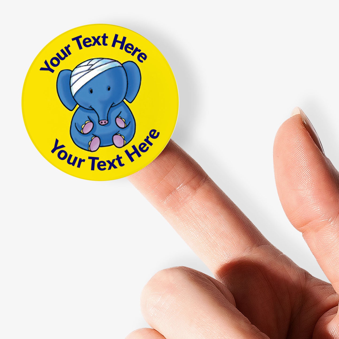 Yellow sticker on a finger with an elephant with a bandage on it's head as a central image.  Space for personalisation above and below the image.