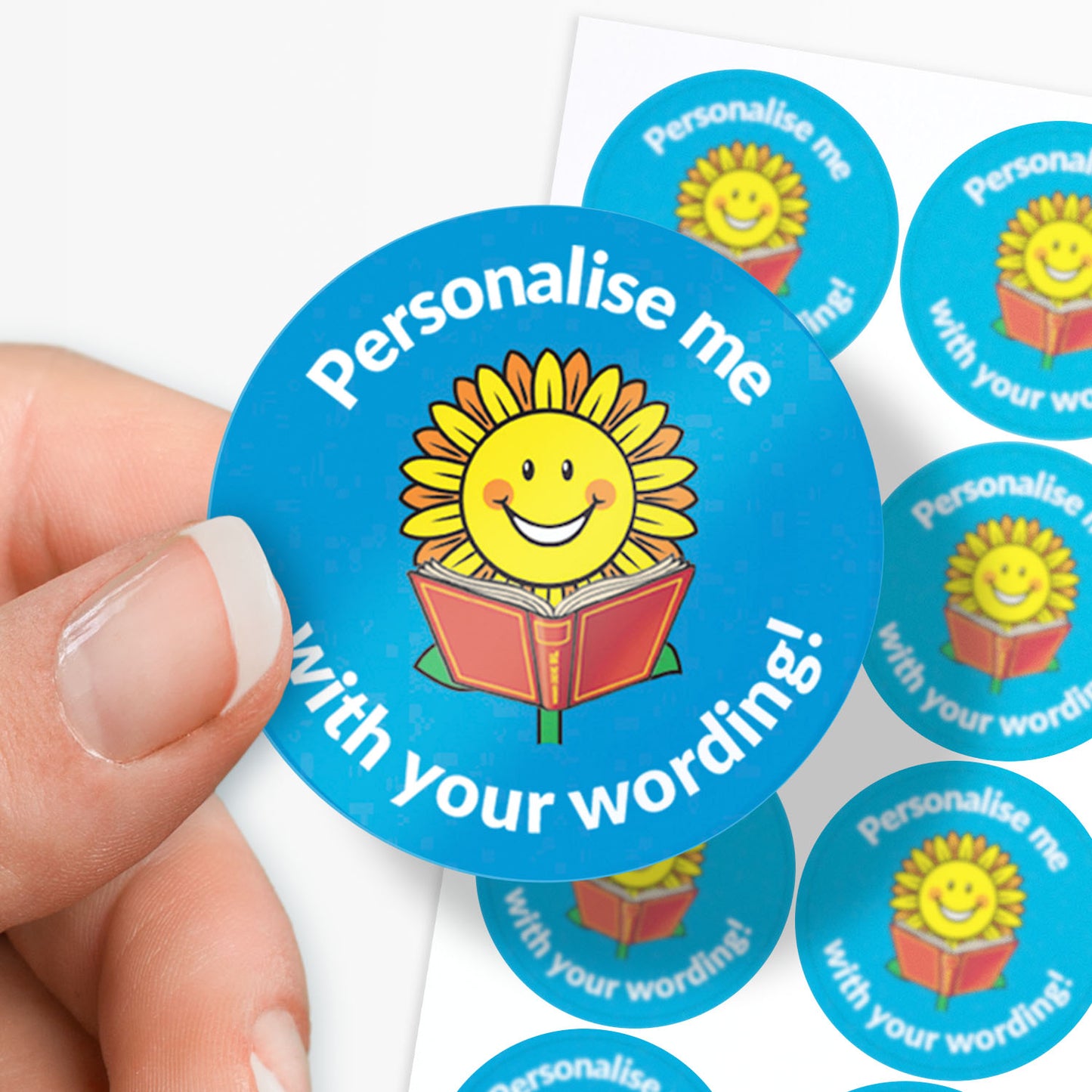 Blue stickers with a smiling sunflower reading a book as a central image.  Space for personalisation above and below the image.