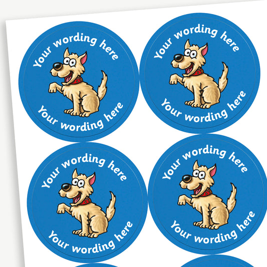 A sheet of customisable circular stickers featuring a cartoon dog with a paw raised against a blue background; includes customisable text above and below the image.