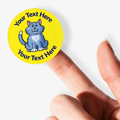 Personalizable sticker with a cat illustration and text space, held by a hand.