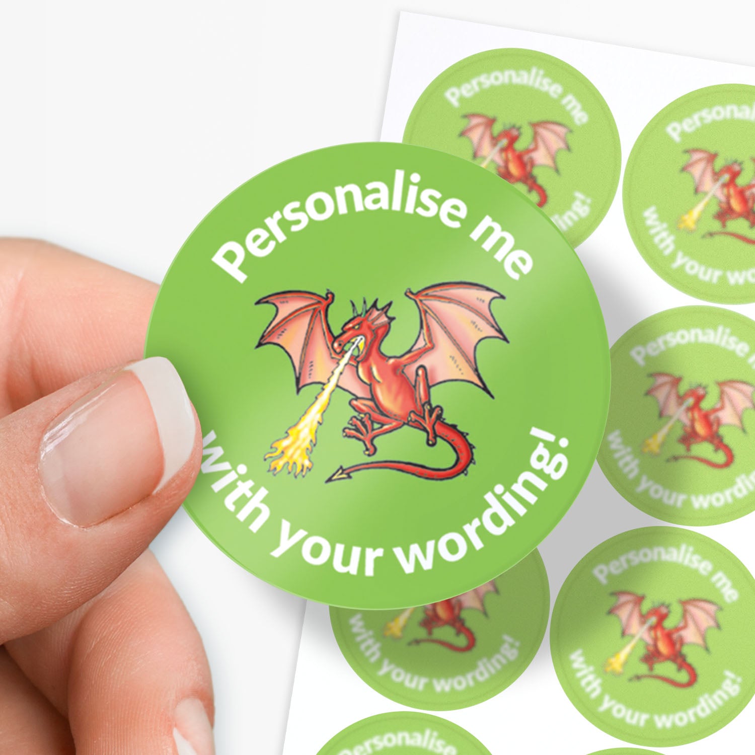 Green stickers with a fire breathing dragon as the central image.  Space for personalisation above and below the image.
