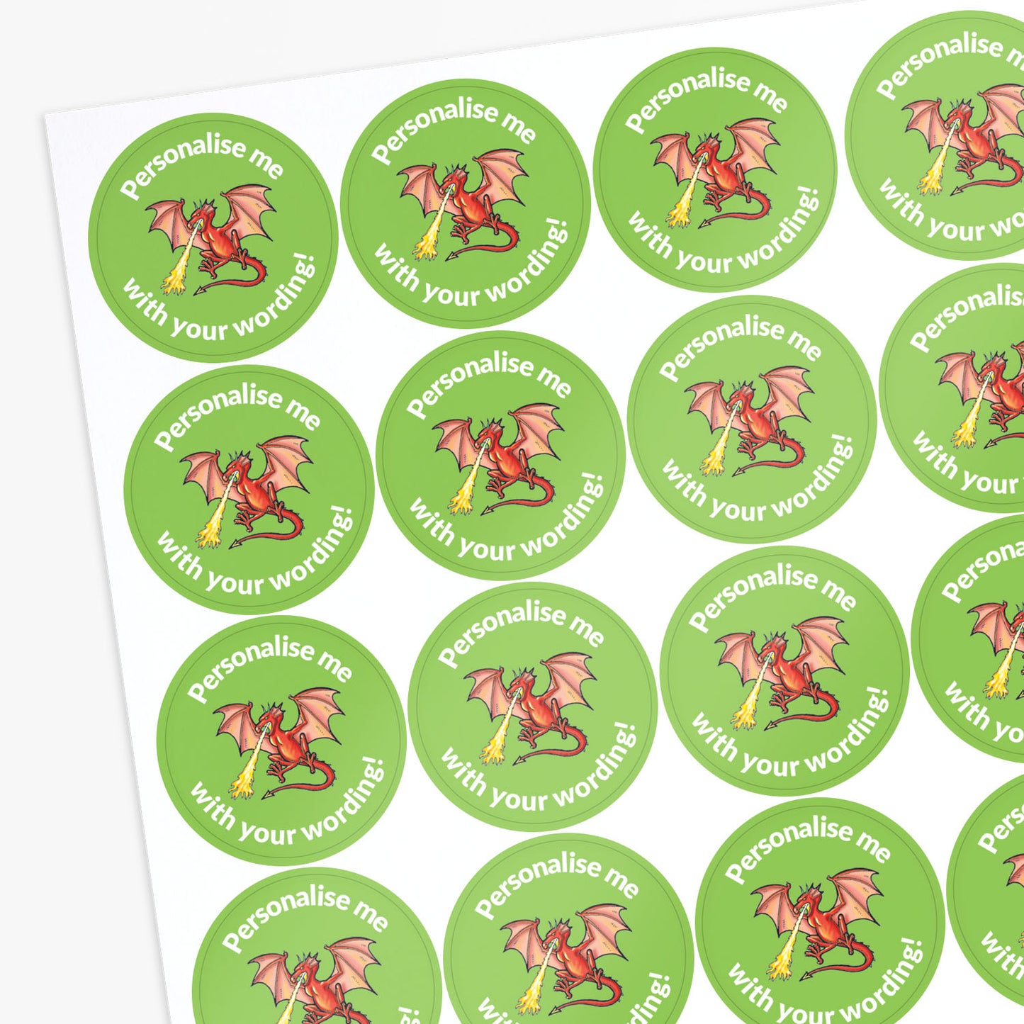 Green stickers with a fire breathing dragon as the central image.  Space for personalisation above and below the image.