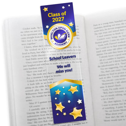 A colourful acrylic bookmark with a blue background decorated with golden and white stars. The top features placeholder text 'Class of 2025' above a circular logo upload. Below that is the main area for custom text, marked 'School Leavers  We will miss you!'. The overall design is vibrant and celebratory, suitable for recognition or motivational purposes.