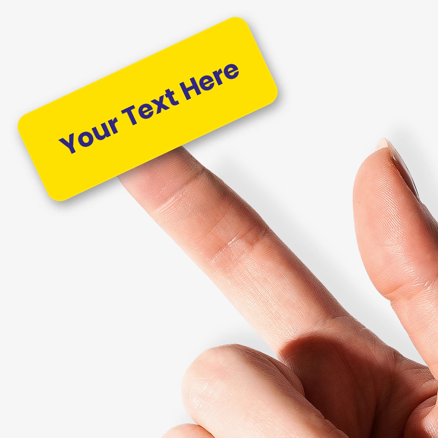 Yellow stickers with blue text held by a hand on a white background