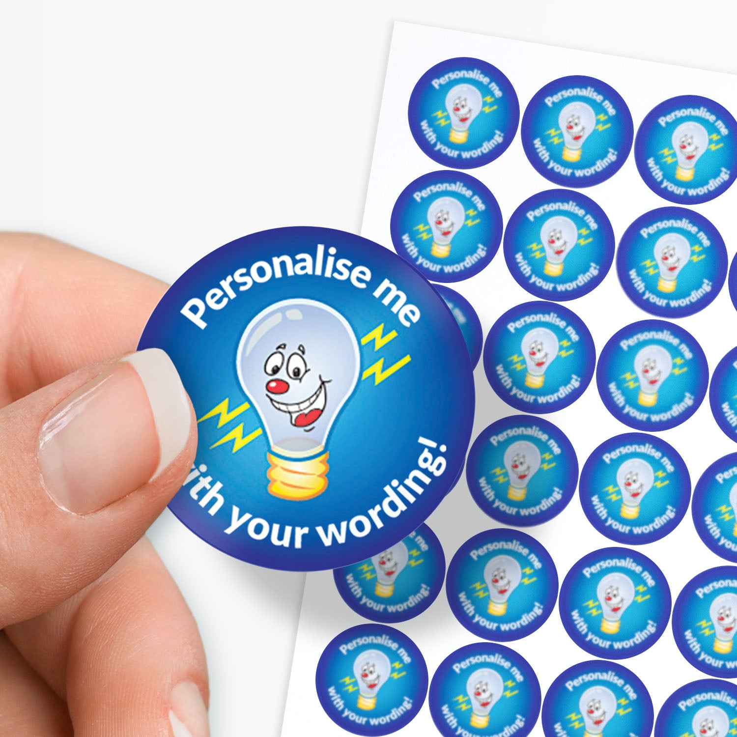 Sheet of blue circular sticker with a lightbulb character and text between a finger and thumb