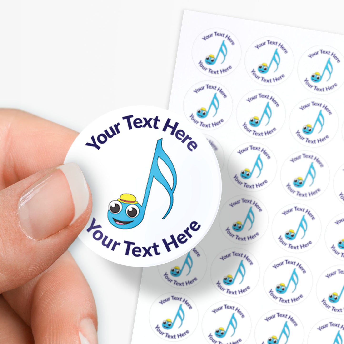 White stickers with a smiling musical note as a central image.  Space for personalisation above and below the image.
