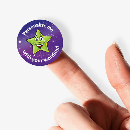 Round purple sticker with a green star and text on a finger against a white background
