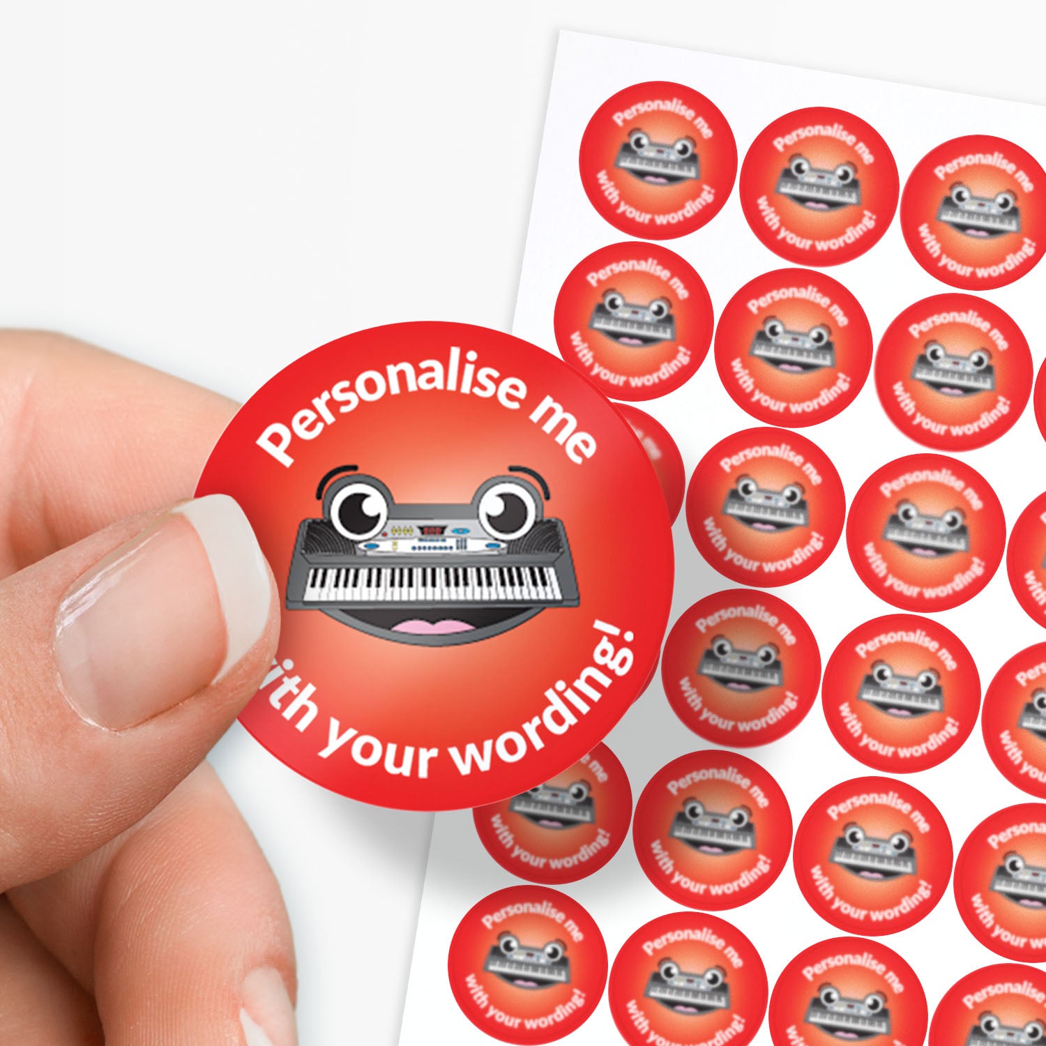 Red stickers with a smiling piano keyboard as a central image.  'Personalise me with your wording!' 