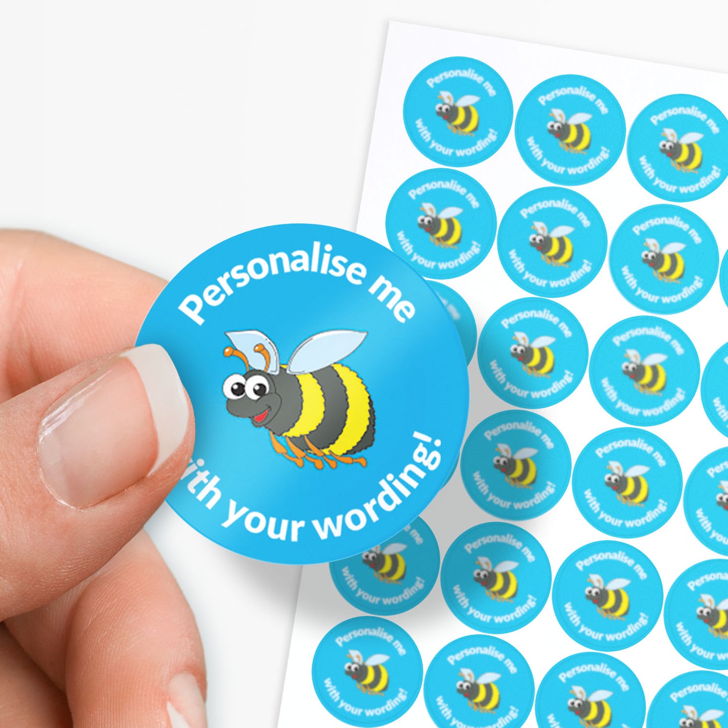 Blue stickers with a bee as a central image.  'Personalise me with your wording!' surrounds the image.