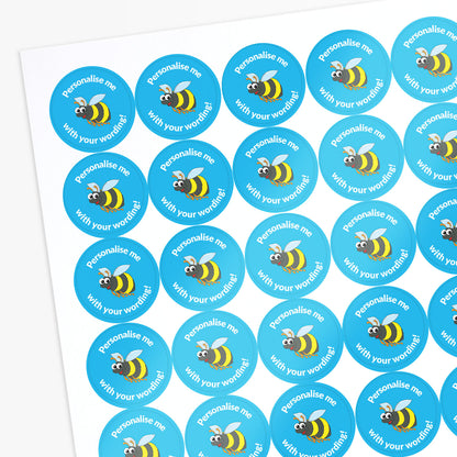 Sheet of blue stickers with bee graphics and text on a white background