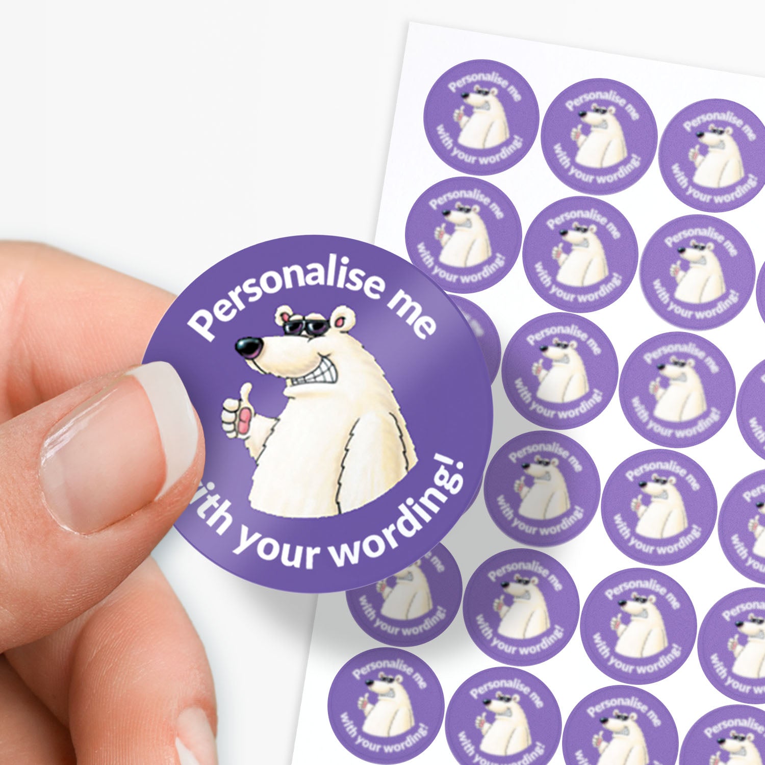 Purple stickers with a polar bear as a central image.  'Personalise me with your wording!' surrounds the image.
