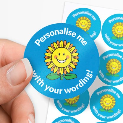 Blue sticker with a smiling sunflower central with 'Personalise me' above and 'with your wording' below