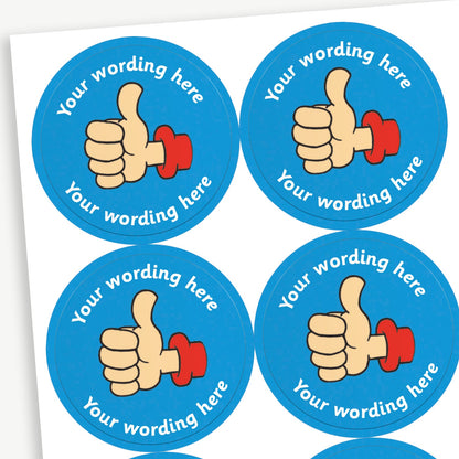 A sheet of blue stickers featuring a thumbs up in the centre.  Placeholder text 'Your wording here' is above and below the image for customisation.