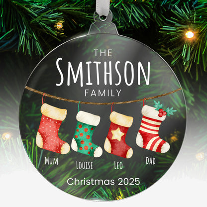 Personalised Christmas acrylic bauble with stockings and family names  hanging on a tree
