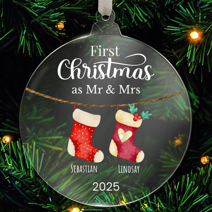Personalised Christmas acrylic bauble with stockings and family names  hanging on a tree