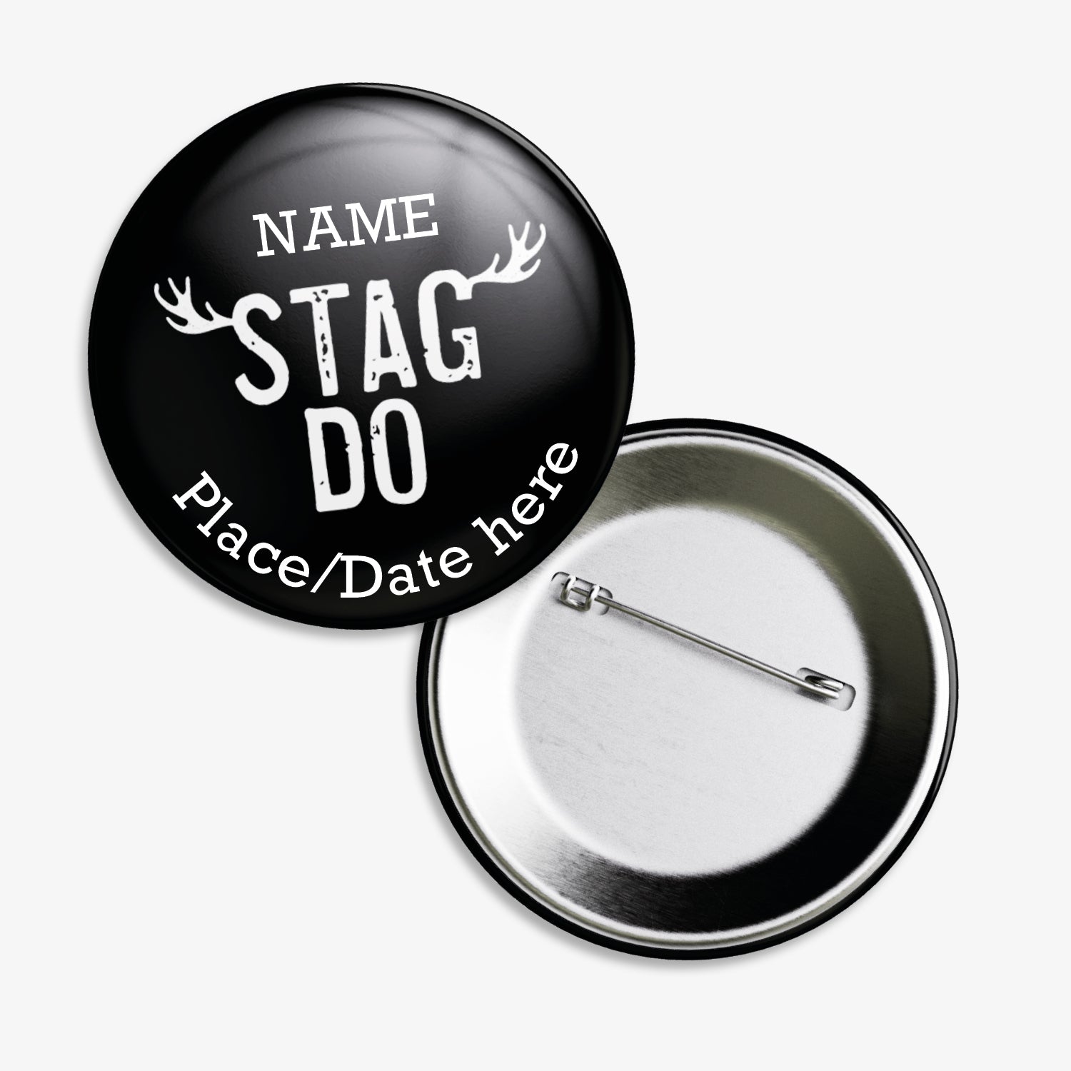A set of ten 38mm round badges with a black background, featuring the phrase "STAG DO" in bold white capital letters at the centre, flanked by stylised white antlers; customisable white text areas are positioned above and below the central design, and the badge includes a safety pin backing.
