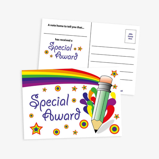 A  bright and cheerful 'Special Award' postcard with a white background. The top features a colourful rainbow ribbon flowing across the page. To the right is a large blue cartoon pencil surrounded by multicoloured paint splashes and stars. The reverse side has space for a message with the prompts 'A note home to tell you that…' with a space for a name, 'has received a' with a logo saying 'Spacial Award' along with address lines and a stamp box