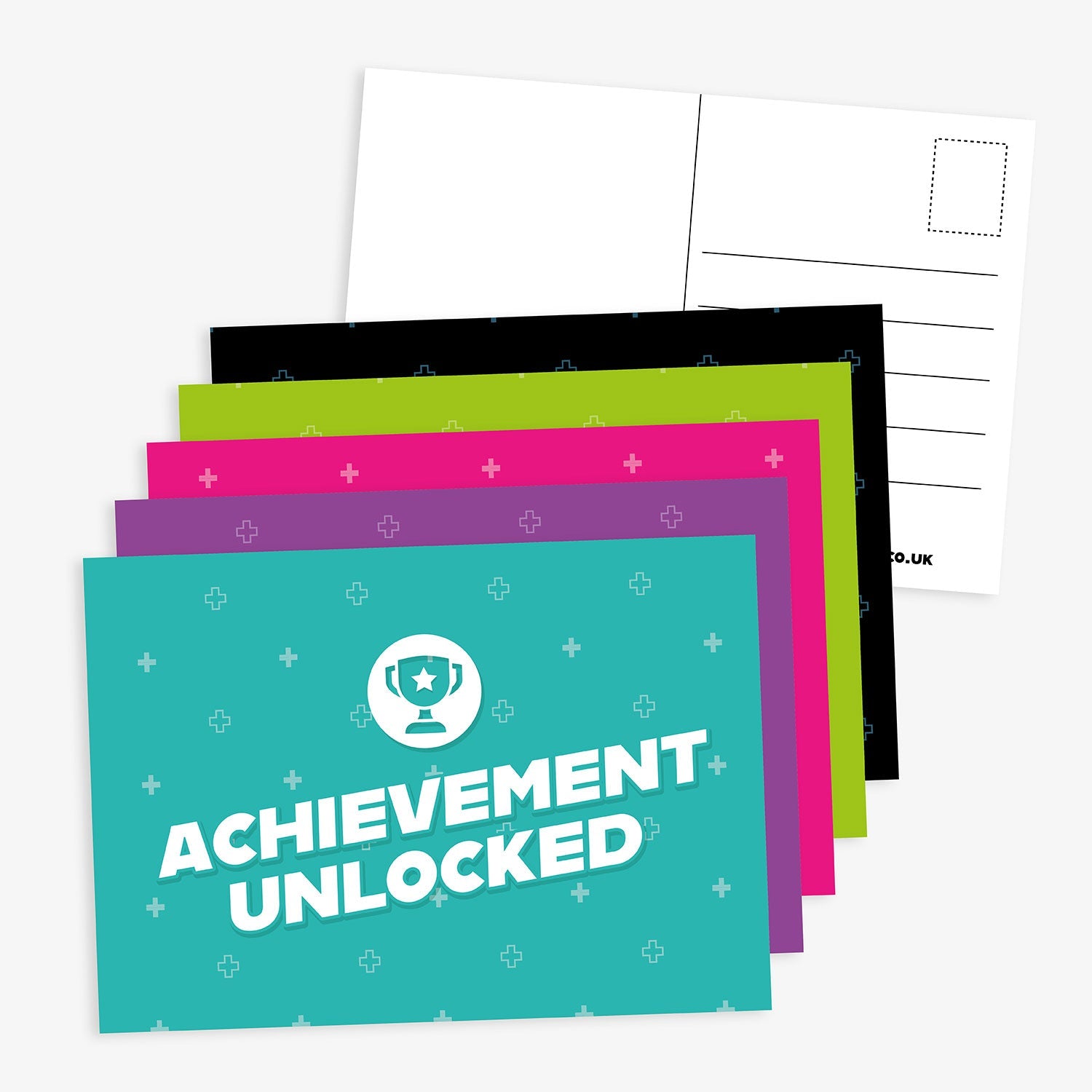Set of brightly coloured A6 postcards with the message 'Achievement Unlocked' on the front, featuring a trophy icon; reverse side includes space for writing and address.