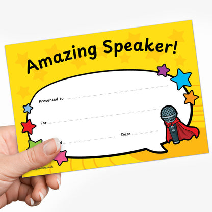 Personalised award certificate with a bright yellow star-themed background, a large white speech-bubble area for award details, and a cartoon microphone wearing a red cape. Includes spaces for recipient name, reason, signature, and date. Suitable for recognising speaking and presentation skills.