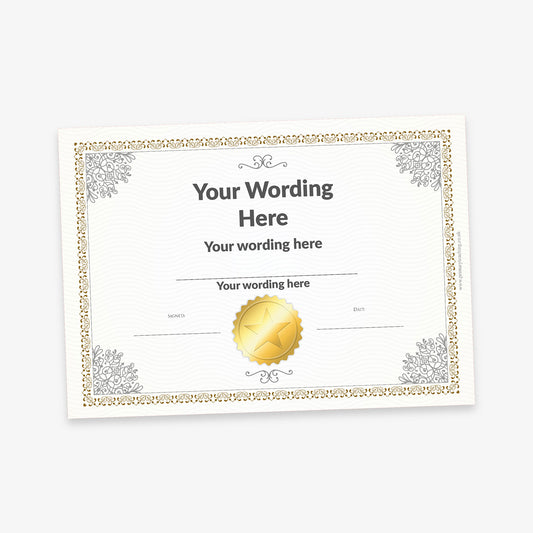 A formal certificate with an ornate silver and gold border, featuring elegant corner embellishments. The layout includes placeholder text for 'Your Wording Here' in large print at the top, followed by smaller text lines for additional custom wording. A gold embossed-style seal is centred toward the bottom. Below it are blank spaces for signatures and dates, designed to give the certificate an official appearance.