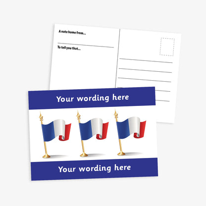 A6-sized personalised postcard featuring three French flags on gold poles against a white background, with customisable text areas above and below the flags in deep blue bands; reverse side includes space for a handwritten message and recipient address—ideal for engaging pupils in French language or cultural activities.