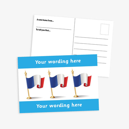 A6-sized personalised postcard featuring three French flags on gold poles against a white background, with customisable text areas above and below the flags in bright blue bands; reverse side includes space for a handwritten message and recipient address—ideal for engaging pupils in French language or cultural activities.