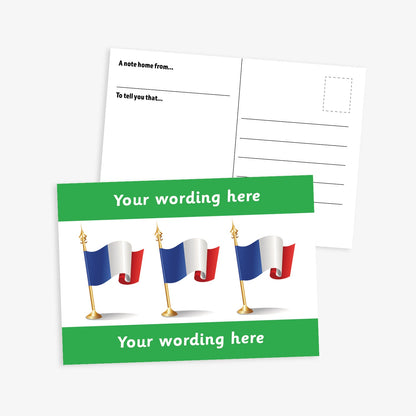A6-sized personalised postcard featuring three French flags on gold poles against a white background, with customisable text areas above and below the flags in green bands; reverse side includes space for a handwritten message and recipient address—ideal for engaging pupils in French language or cultural activities.