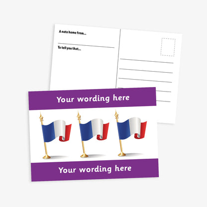 A6-sized personalised postcard featuring three French flags on gold poles against a white background, with customisable text areas above and below the flags in purple bands; reverse side includes space for a handwritten message and recipient address—ideal for engaging pupils in French language or cultural activities.