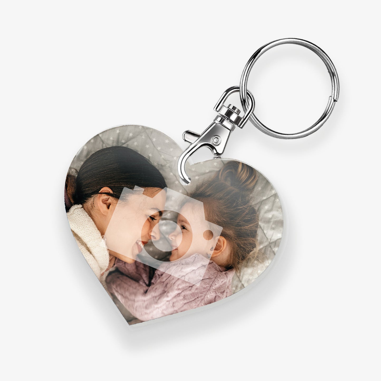A personalised keyring featuring a heart photo frame design with a metal keychain and clasp. The photo shows a mother and daughter. 