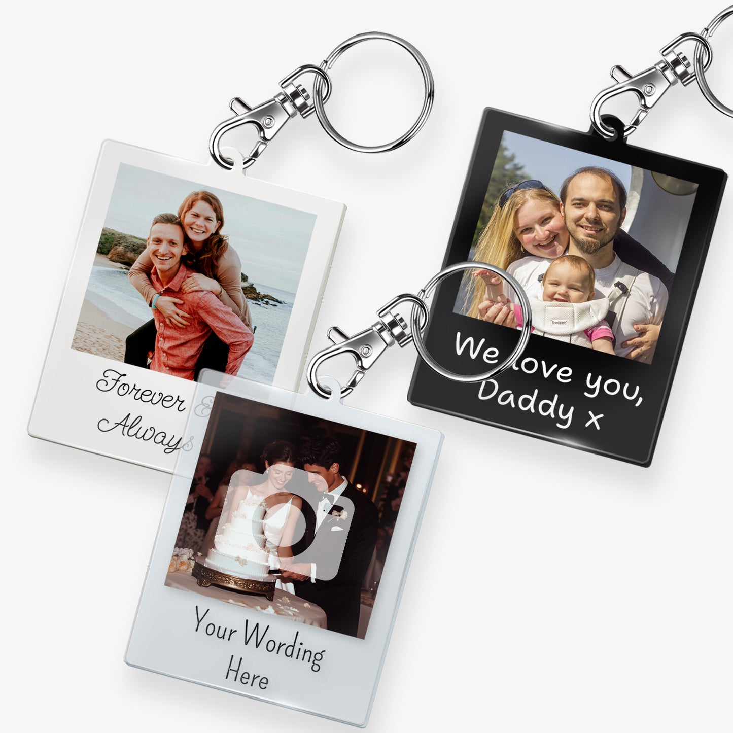 3 personalised keyrings featuring a rectangular photo frame design with a metal keychain and clasp. Photos depicting various scens with the emphasis on customisation and upload your photo. Below the image, there is placeholder text reading. The keyrings have a glossy finish and a polaroid-style layout.