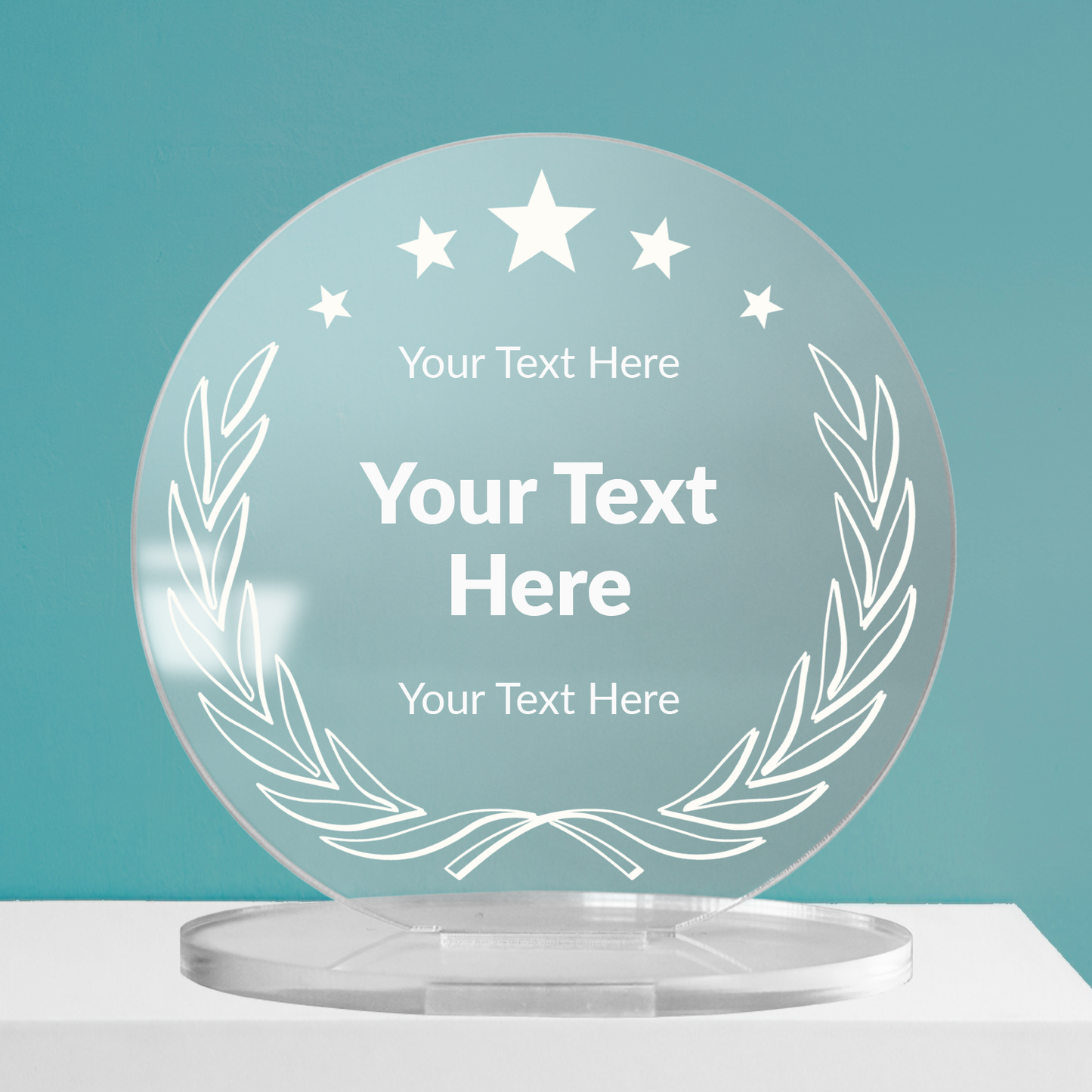 Customisable round acrylic award with laurel wreath design and three stars at the top, displayed against a teal background.