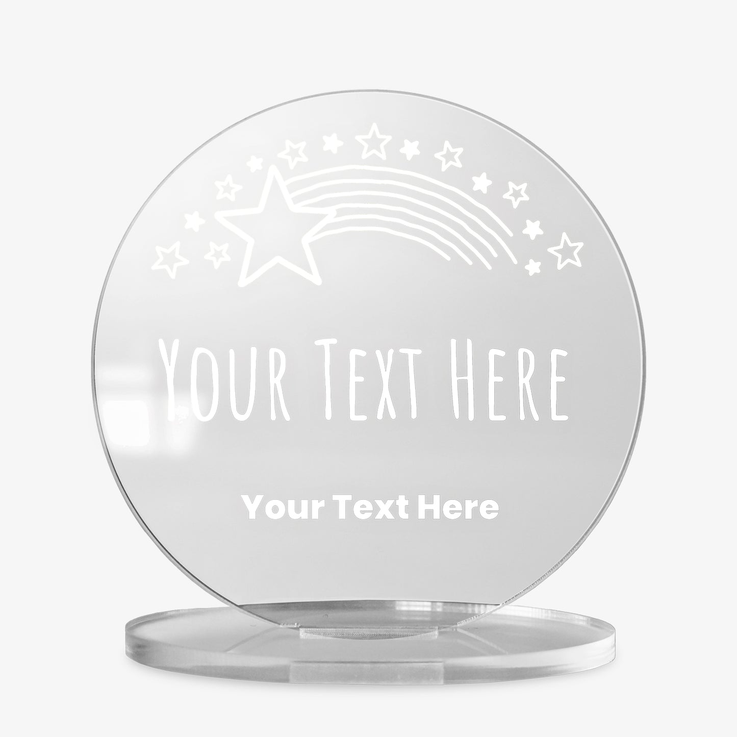 Clear round acrylic award with customisable text, featuring a shooting star and star motif design, displayed against a white background.