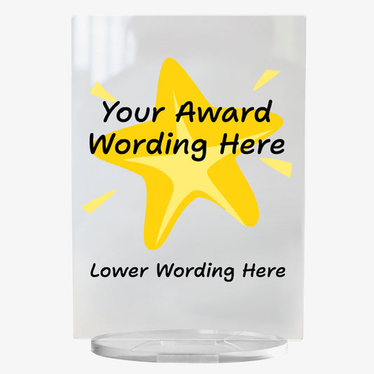 A clear acrylic award plaque standing on a circular base, featuring a large yellow cartoon-style star in the centre. Overlaying the star is placeholder text reading 'Your Award Wording Here' in bold black font. Below the star, additional text reads 'Lower Wording Here'. Yellow accent lines surround the star to give a glowing effect, creating a playful and celebratory design.