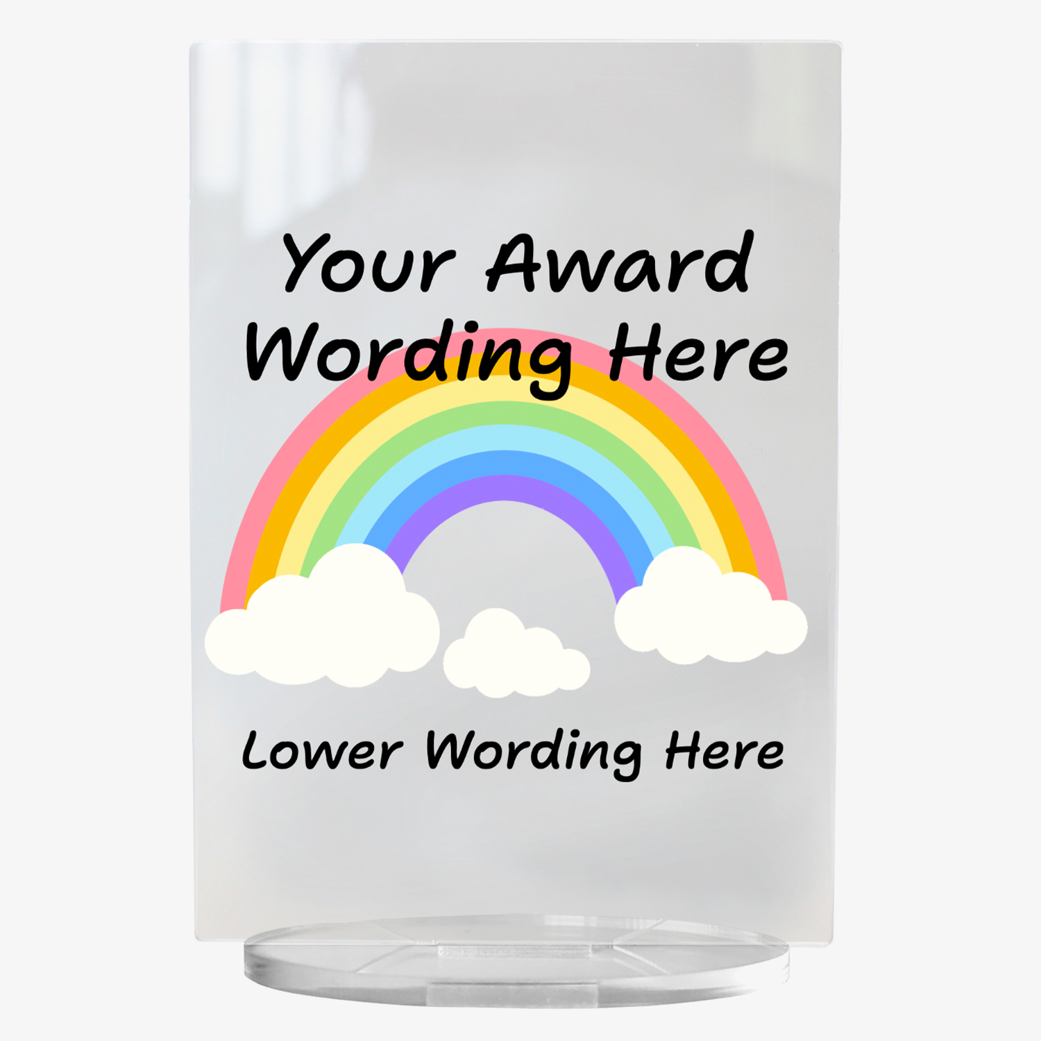 A clear acrylic award plaque standing on a circular base, featuring a large rainbow with either end in a cloud in the centre. Overlaying the rainbow is placeholder text reading 'Your Award Wording Here' in bold black font. Below, additional text reads 'Lower Wording Here'. 