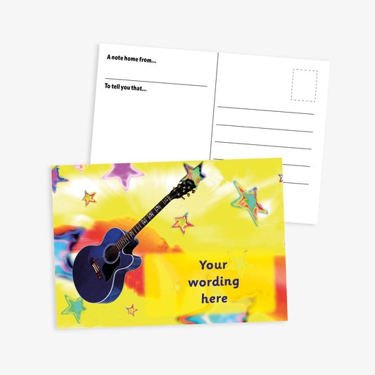 A colourful music-themed postcard. The front features a vibrant yellow background with tie-dye-style swirls and multicoloured stars scattered throughout. A black acoustic guitar is prominently displayed on the left side. On the right is a text box with placeholder wording that reads 'Your wording here'. The reverse side includes standard postcard layout with prompts 'A note home from...' and 'To tell you that...', along with lines for the address and a stamp box.
