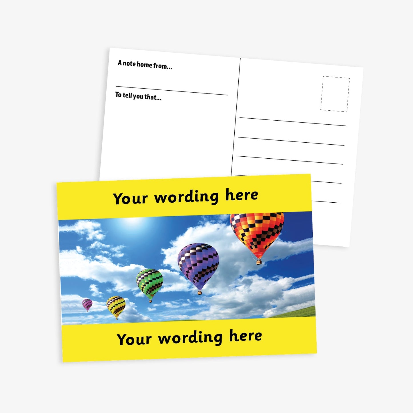 Personalised A6 Hot Air Balloon Postcard, featuring a vibrant yellow border framing a sky scene with multiple colourful hot air balloons floating among clouds. The front side includes the placeholder text 'Your wording here!' in bold white letters, allowing for customisation. The reverse side displays a standard postcard layout with space for a message and address.