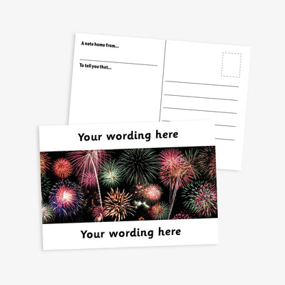 A6-sized personalised postcard featuring a vibrant display of multicoloured fireworks against a black background, with white customisable text areas at the top and bottom reading 'Your wording here'; the reverse side includes designated spaces for sender and recipient details, making it suitable for rewarding pupil achievements.