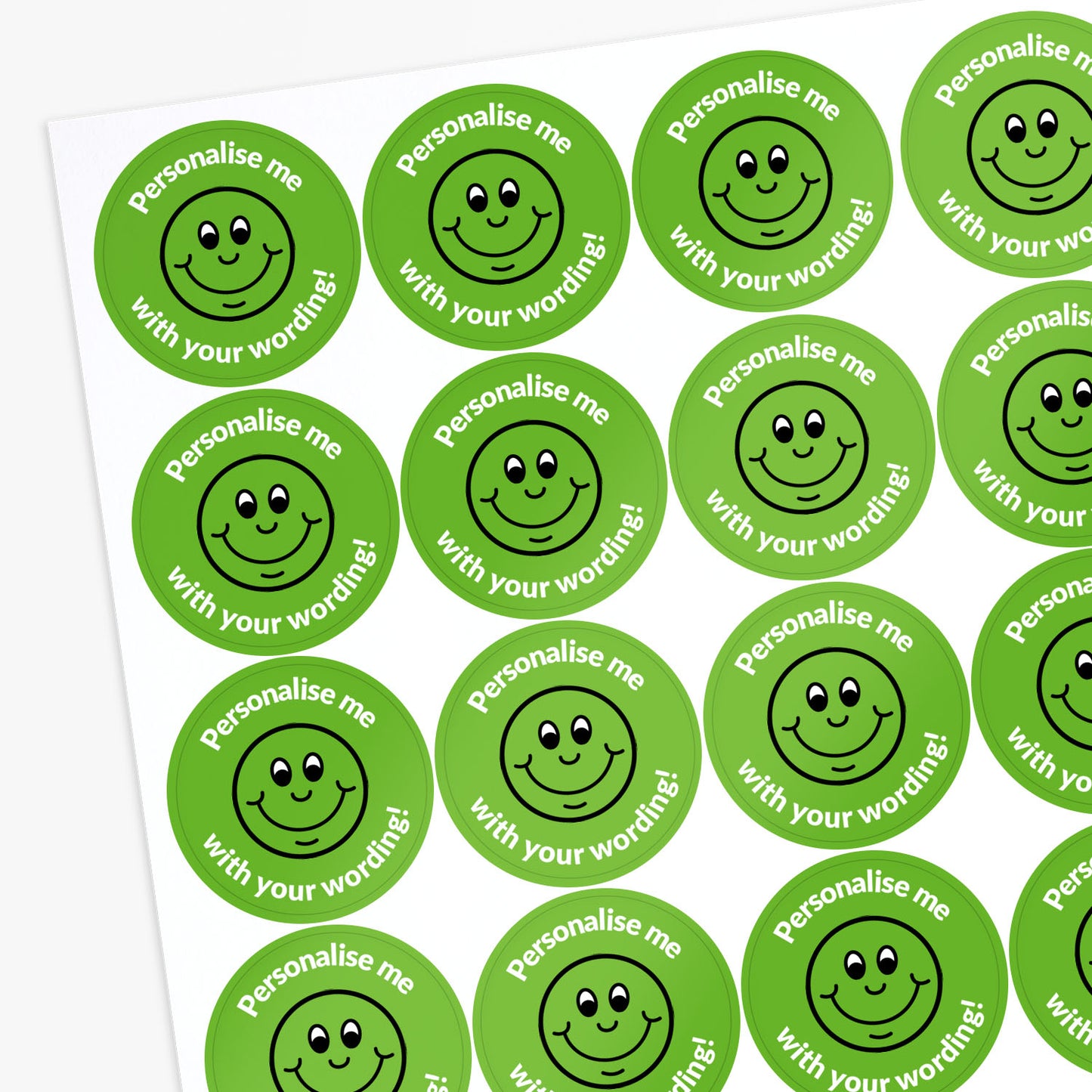 Green stickers with a smiling emoji as the central image.  Space for personalisation above and below the image.