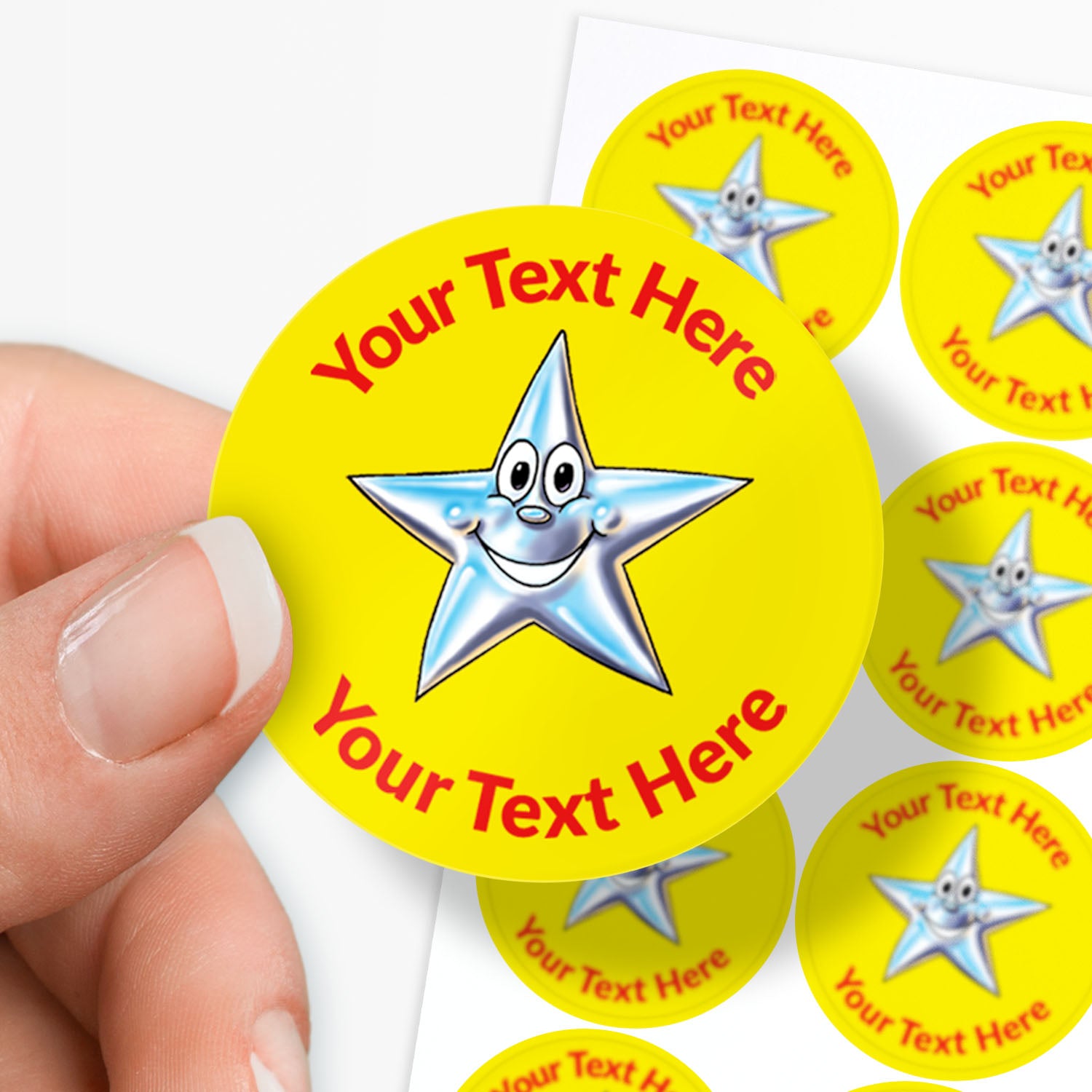 Personalisable yellow stickers with a star design held by a hand